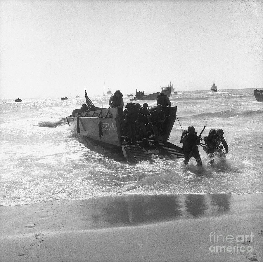 U.s. Troops Arrive On Beach Photograph by Bettmann