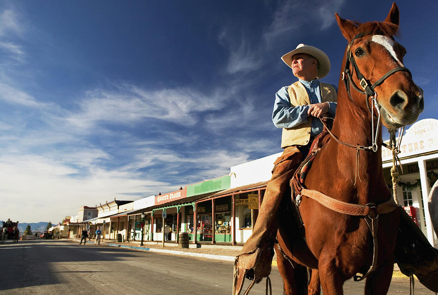 Usa, Arizona, Tombstone, Mature Cowboy Photograph by Walter Bibikow