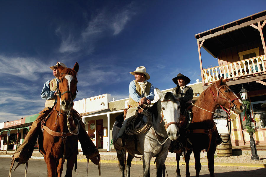 Usa, Arizona, Tombstone, Three Cowboys Photograph by Walter Bibikow