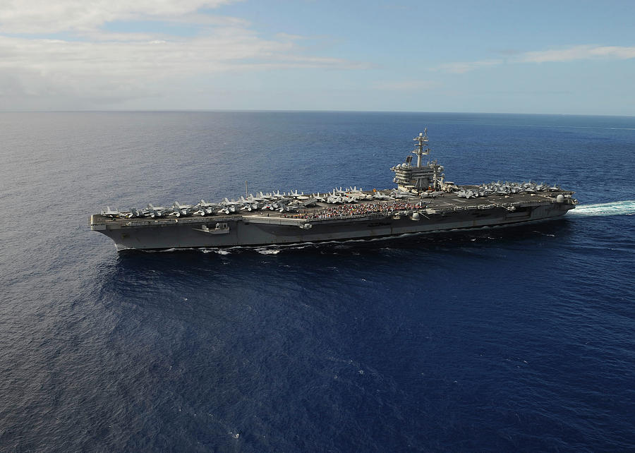 Uss Theodore Roosevelt Departs Photograph by Stocktrek Images