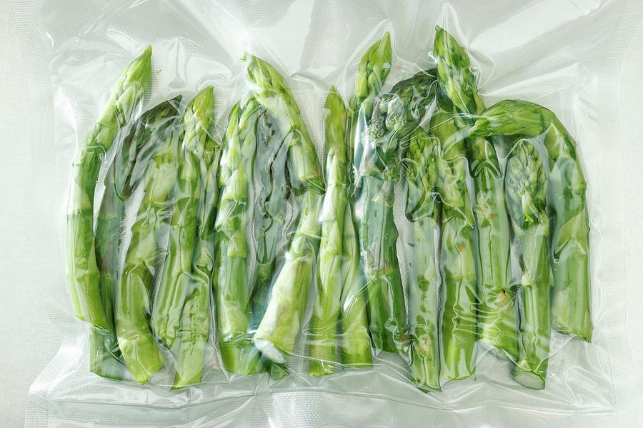 Vacuum-packed Green Asparagus Photograph by Petr Gross