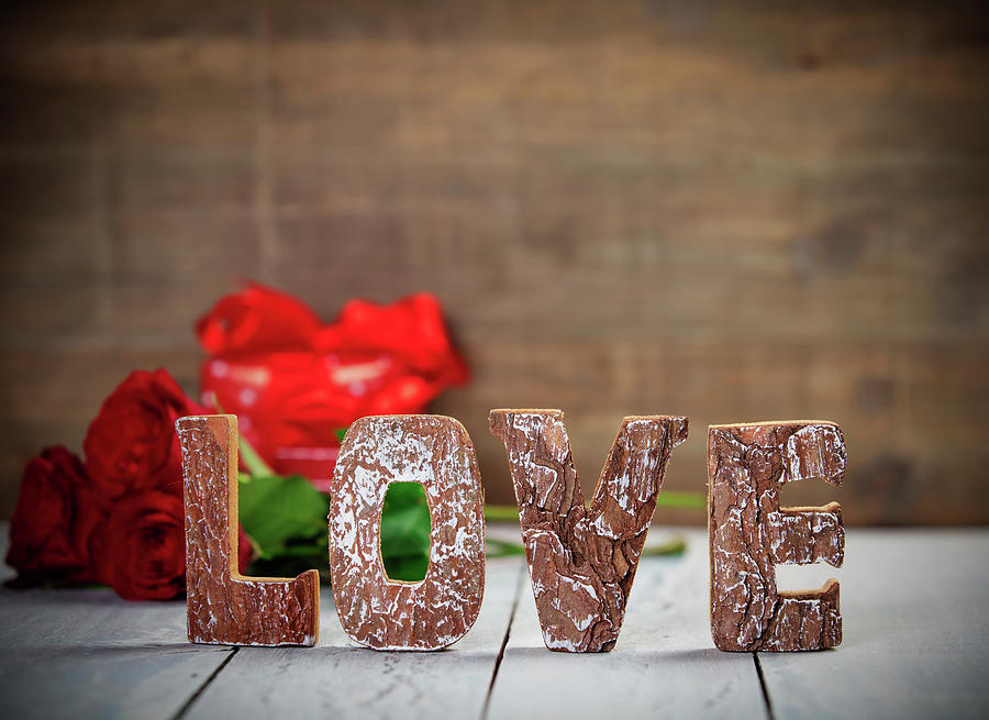Valentine's Day concept. Love wooden letters on wooden rustic ...