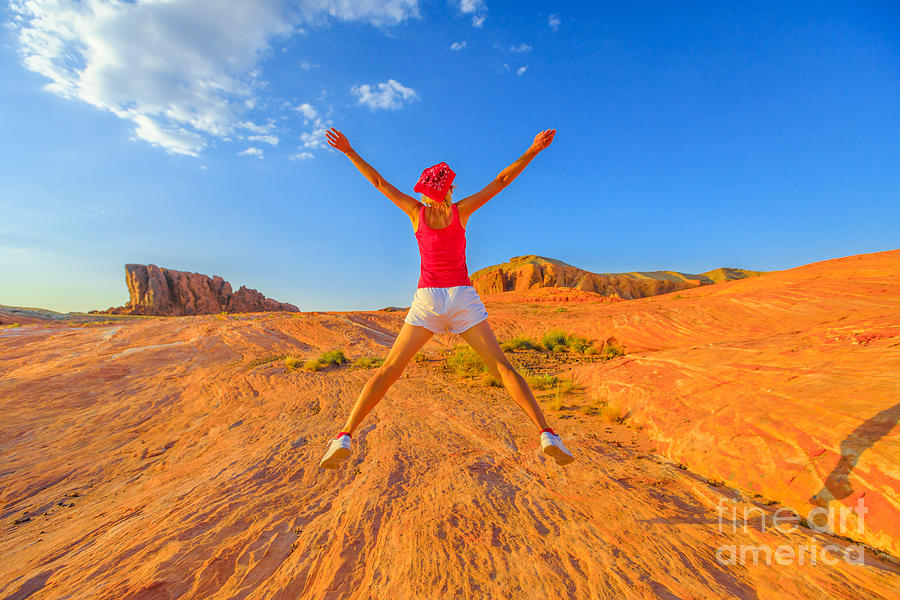 Valley of Fire jumping Photograph by Benny Marty