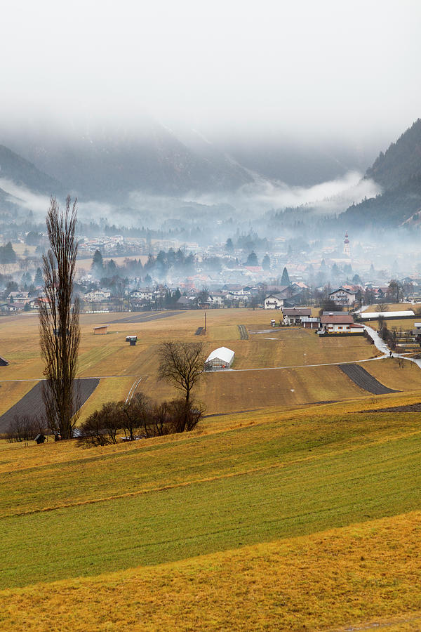 Valley Village In Rainy Mist Photograph by Merten Snijders