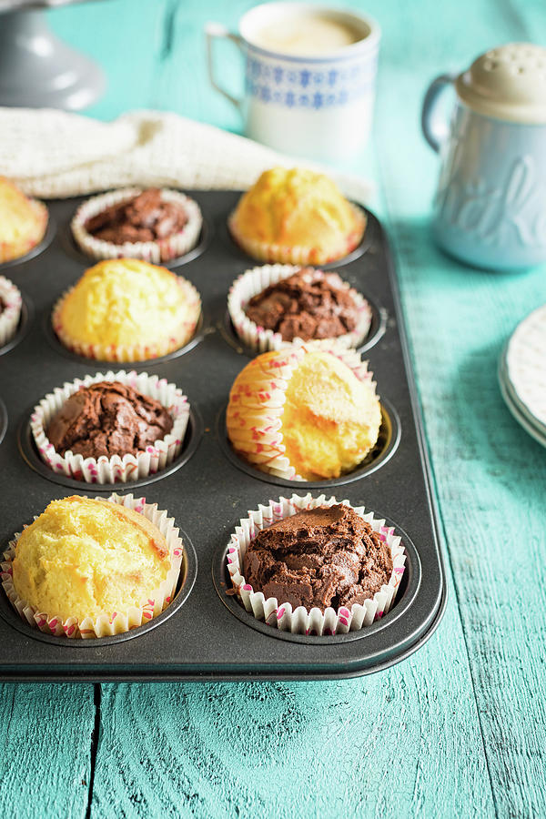 Vanilla And Chocolate Simple Muffins In A Baking Tray Photograph by Osmykolorteczy