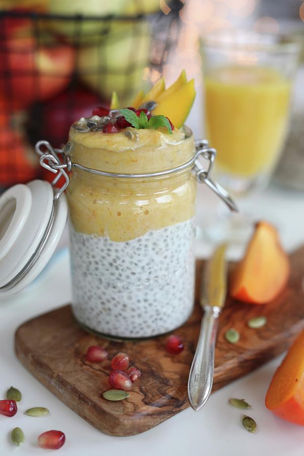Vanilla And Coconut Chia Pudding. Yellow Layer Consists Of Bananas And Mango Photograph by Dorota Ryniewicz