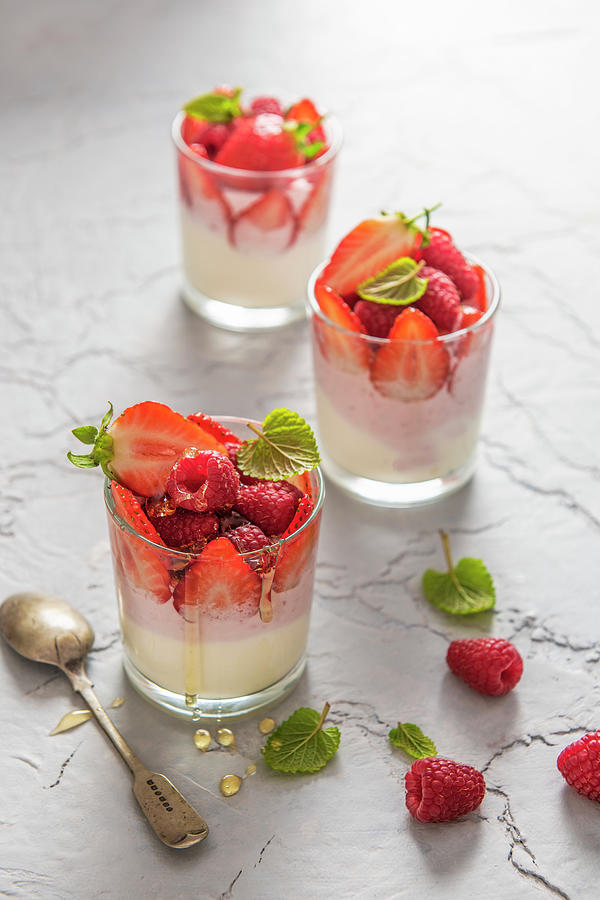 Vanilla And Strawberry Greek Yoghurt With Fresh Berries And Honey Photograph by Magdalena Hendey