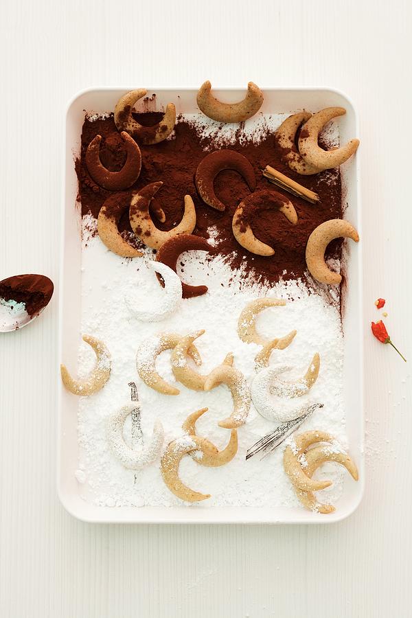 Vanilla Crescent Biscuits With Icing Sugar And Cocoa Powder seen From Above Photograph by Michael Wissing
