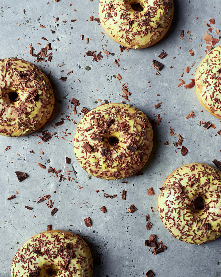 Vanilla Doughnuts With Chocolate Sprinkle Photograph by Miha Lorencak