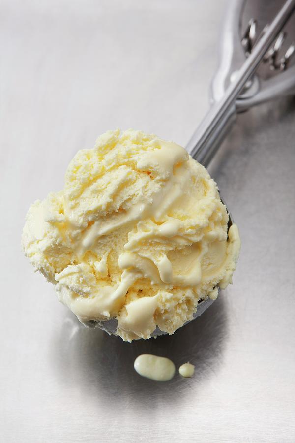 Vanilla Ice Cream In An Ice Cream Scoop Photograph by Younes Stiller