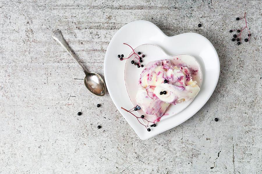Vanilla Ice Cream With Elderberry Sauce On A Heart-shaped Plate seen From Above Photograph by Mandy Reschke