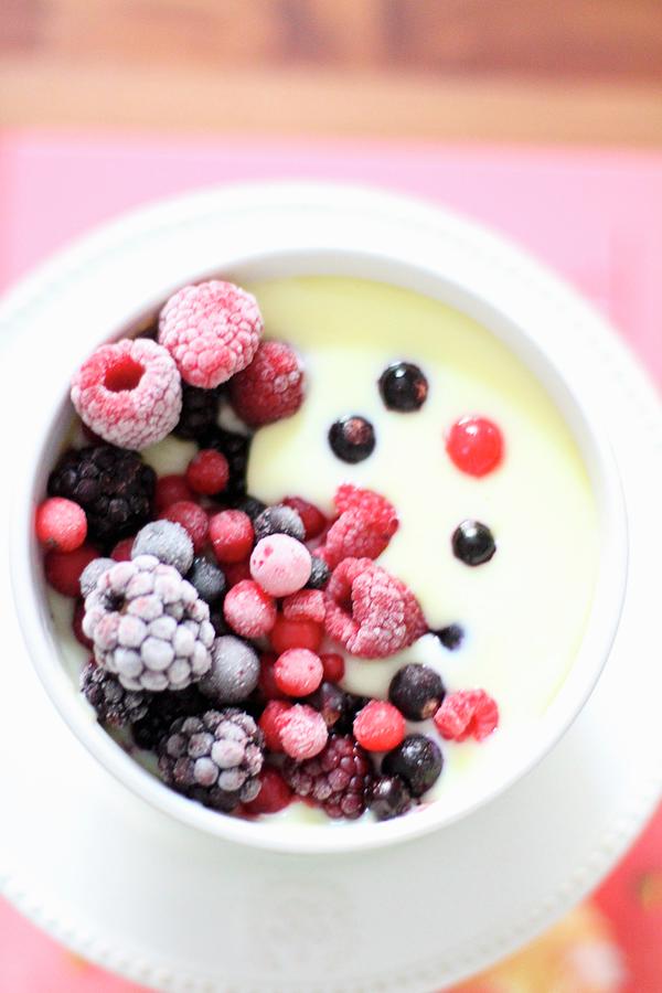 Vanilla Pudding With Frozen Berries Photograph by Sylvia E.k Photography