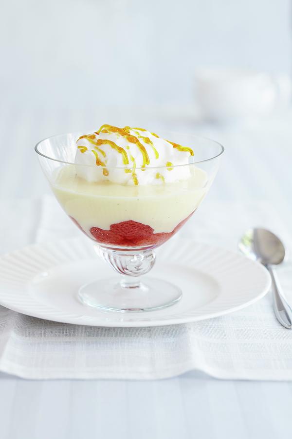 Vanilla Pudding With Strawberries, Cream And Caramel Sauce Photograph by Charlotte Tolhurst