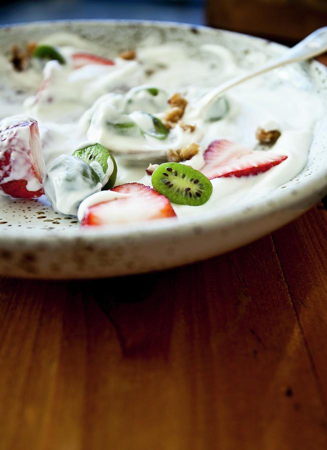 Vanilla Yogurt With Sliced Strawberries And Kiwi Berries mini Kiwi, On A Speckled Plate On A Wooden Tray Photograph by Ryla Campbell