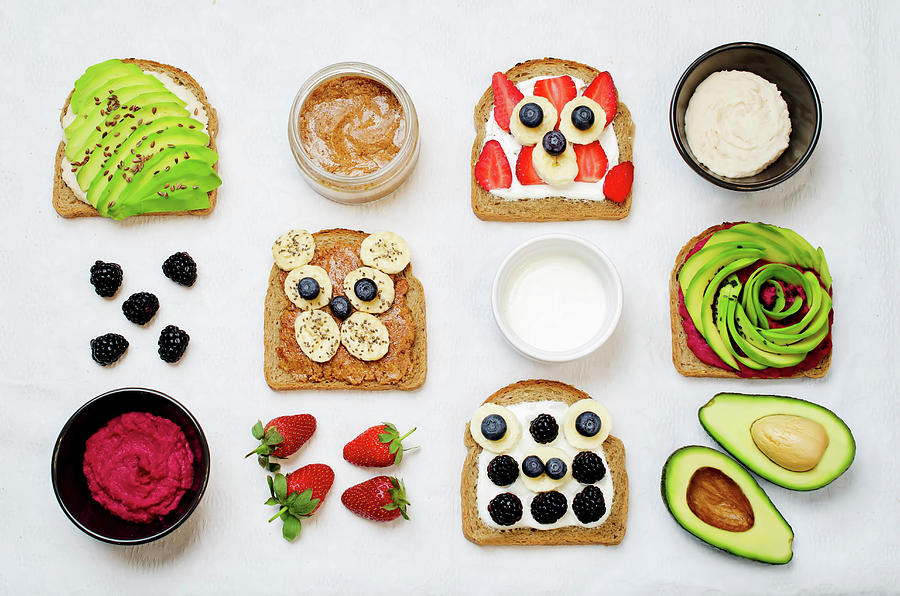 Variation Of Healthy Rye Breakfast Sandwiches With Avocado, Hummus, And Berries Photograph by Natasha Arz