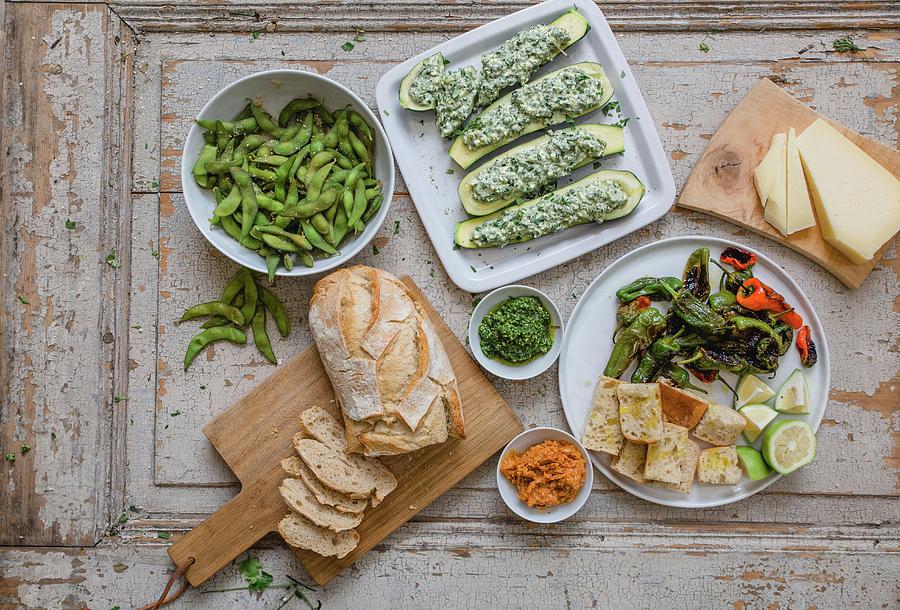 Various Appetizers: Edamame, Stuffed Zucchini, Pimientos, Bread And Cheese Photograph by Sabine Steffens
