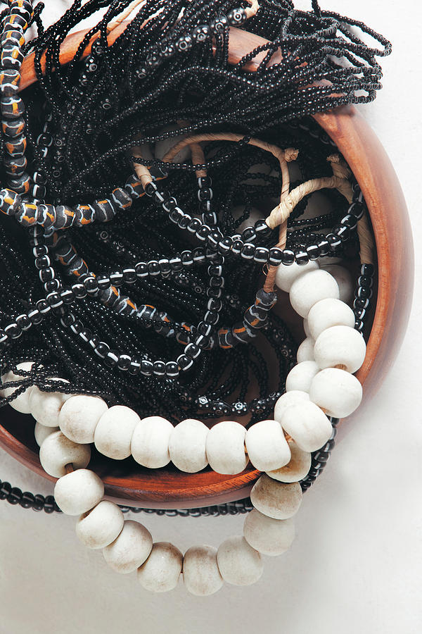 Various Black And White Necklaces In Wooden Bowl Photograph by Great Stock!