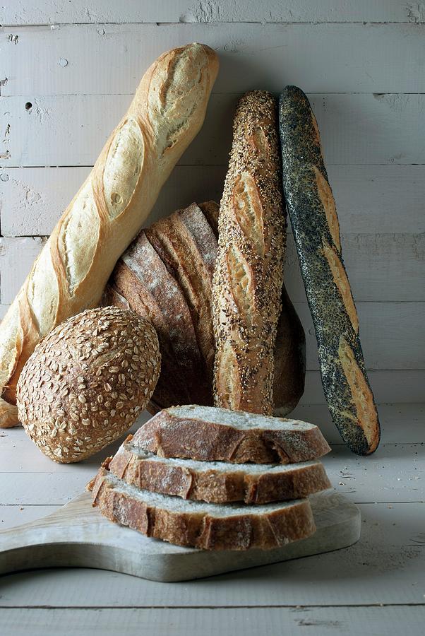Various Breads And Slices Of Bread Photograph by Spyros Bourboulis
