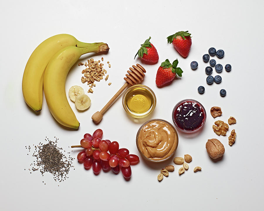 Various Breakfast Ingredients On A White Surface Photograph by Michael S. Harrison