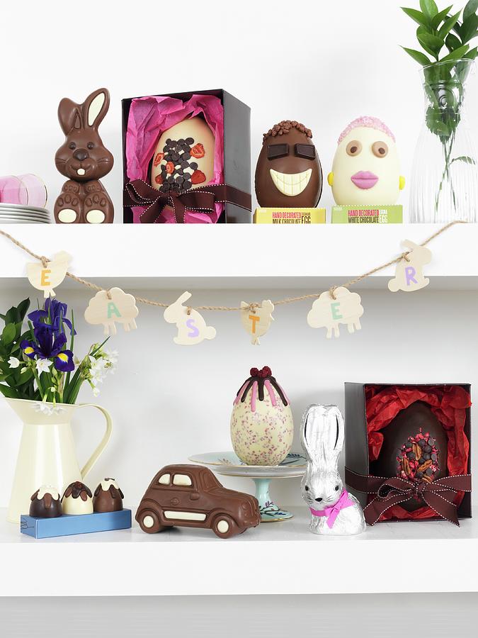 Various Chocolate Easter Treats On Floating Shelves Photograph by Jonathan Gregson