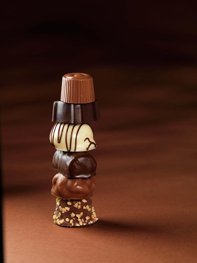 Various Chocolates, Stacked In A Tower Photograph by Jim Scherer