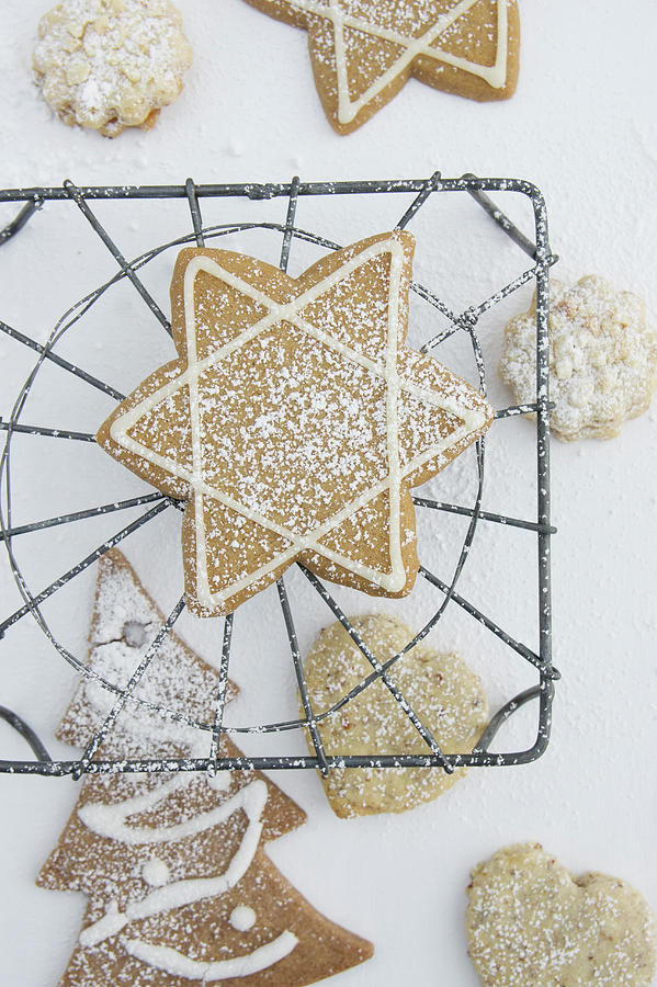 Various Christmas Cookies With A Cooling Rack Photograph by Martina Schindler