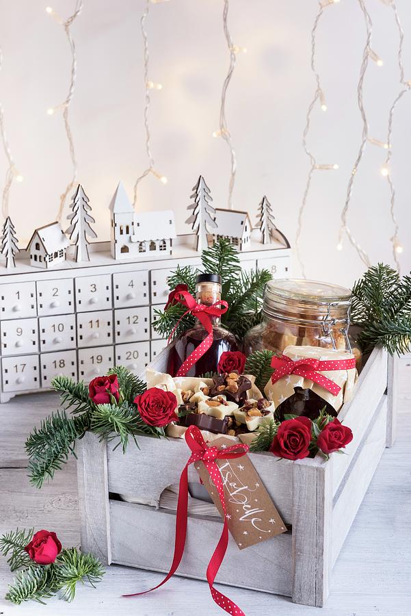 Various Christmas Gift Foods In A Wooden Crate Photograph by Winfried Heinze