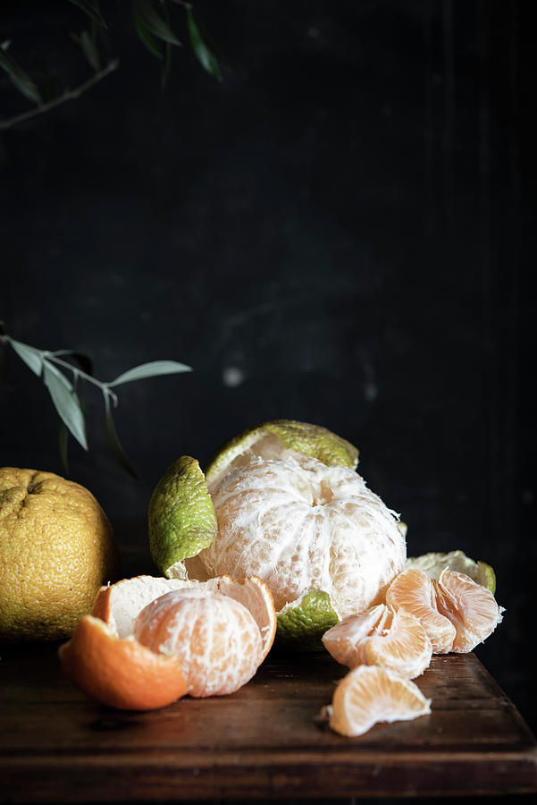 Various Citrus Fruits, Partially Peeled Photograph by Justina Ramanauskiene