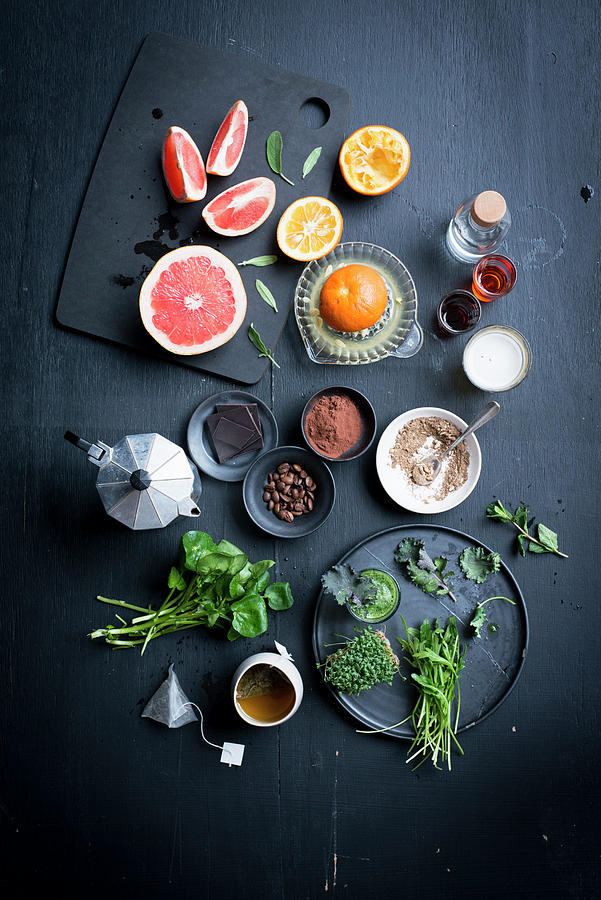 Various Citrus Fruits, Tea, Cocoa And Herbs Photograph by Manuela Rther