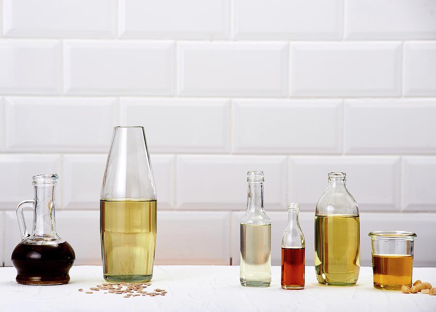 Various Cooking Oils In Glass Containers Photograph by Great Stock!