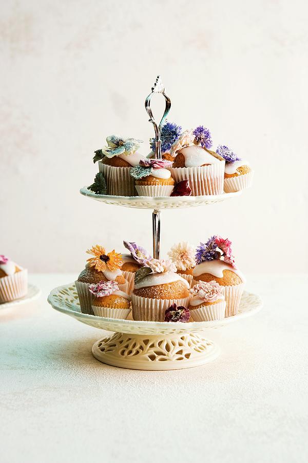 Various Cupcakes Decorated With Flowers On A Cake Stand Photograph by Michael Wissing