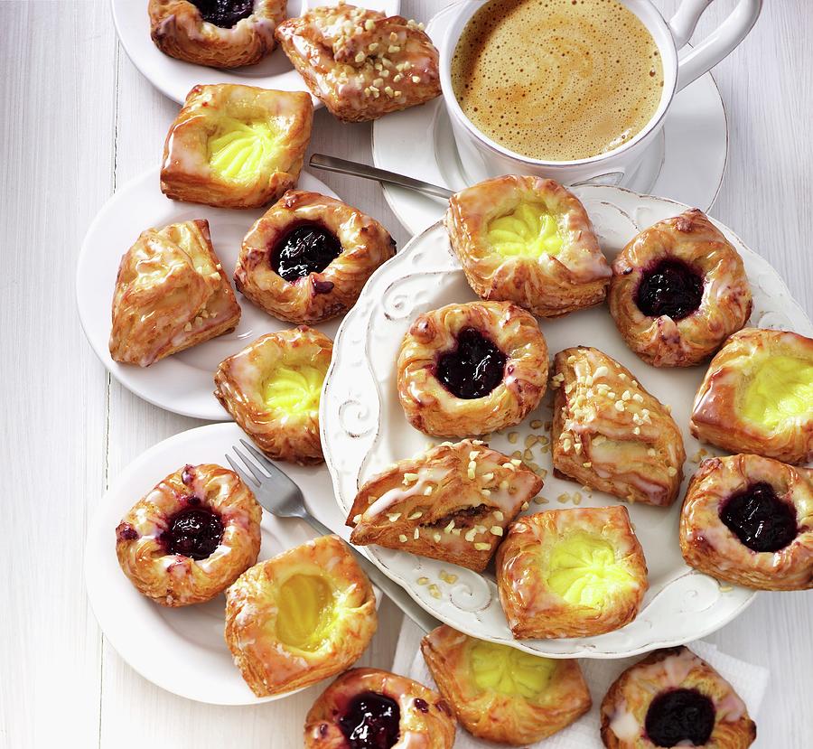Various Danish Pastries Served With Coffee Photograph by Christopher Mick