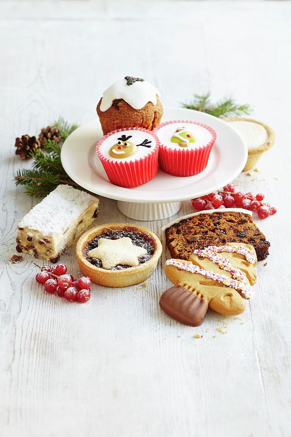 Various Different Christmas Cakes, Mince Pies, Biscuits And Cupcakes Photograph by Charlotte Tolhurst
