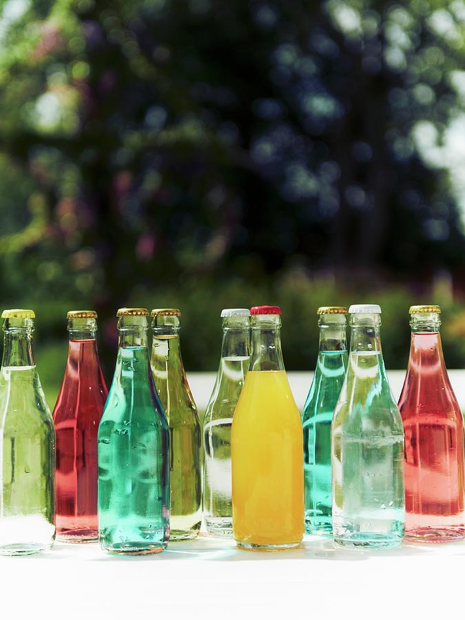 Various Drinks In Bottles For A Mid-summer Festival Photograph by Hannah Kompanik