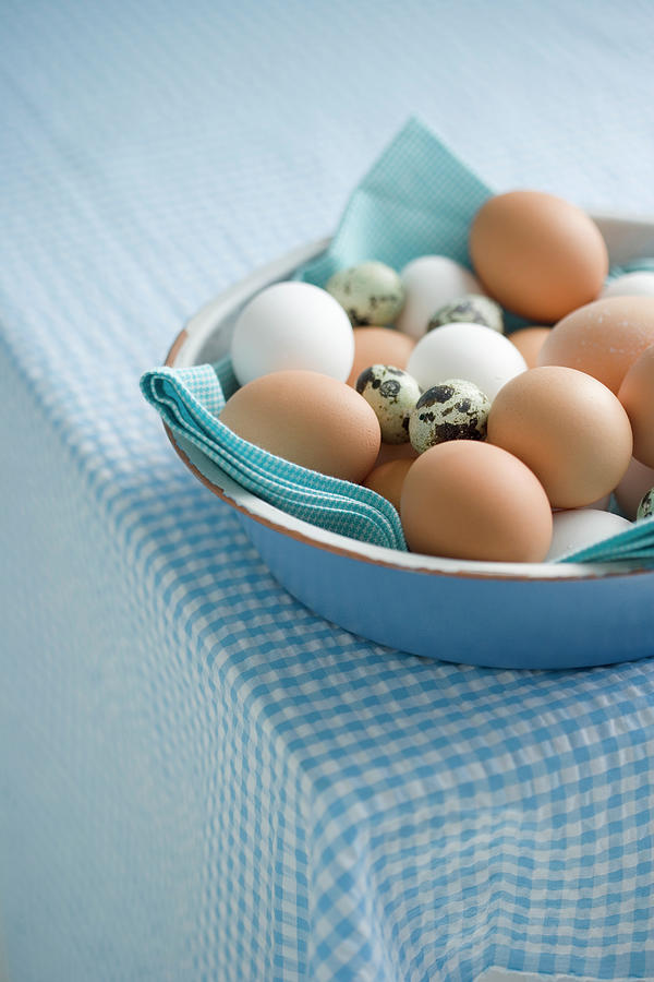 Various Eggs In A Ceramic Bowl Photograph by Colin Cooke