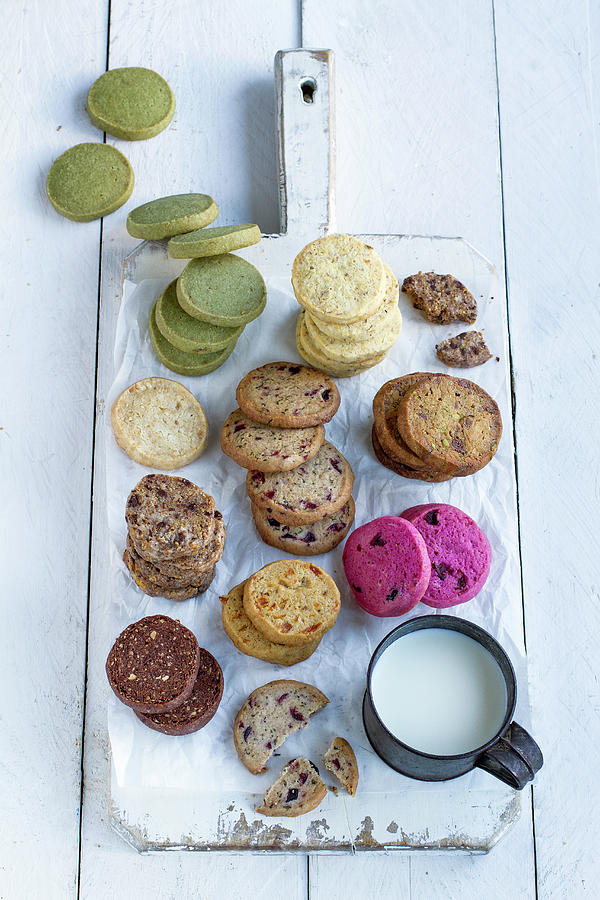 Various Flavored Cookies On A Wooden Board Photograph by Eising Studio