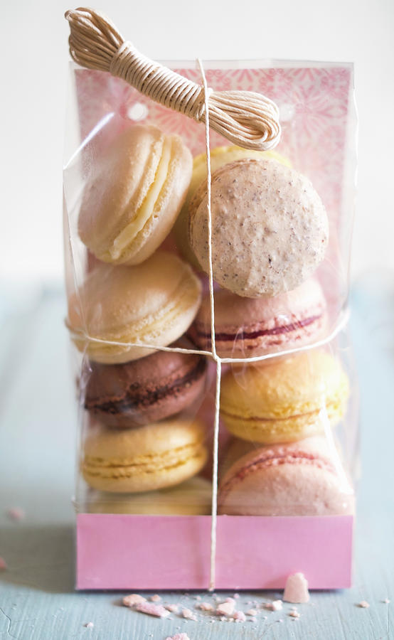 Various French Macarons In Cellophane Wrap Photograph by Eising Studio
