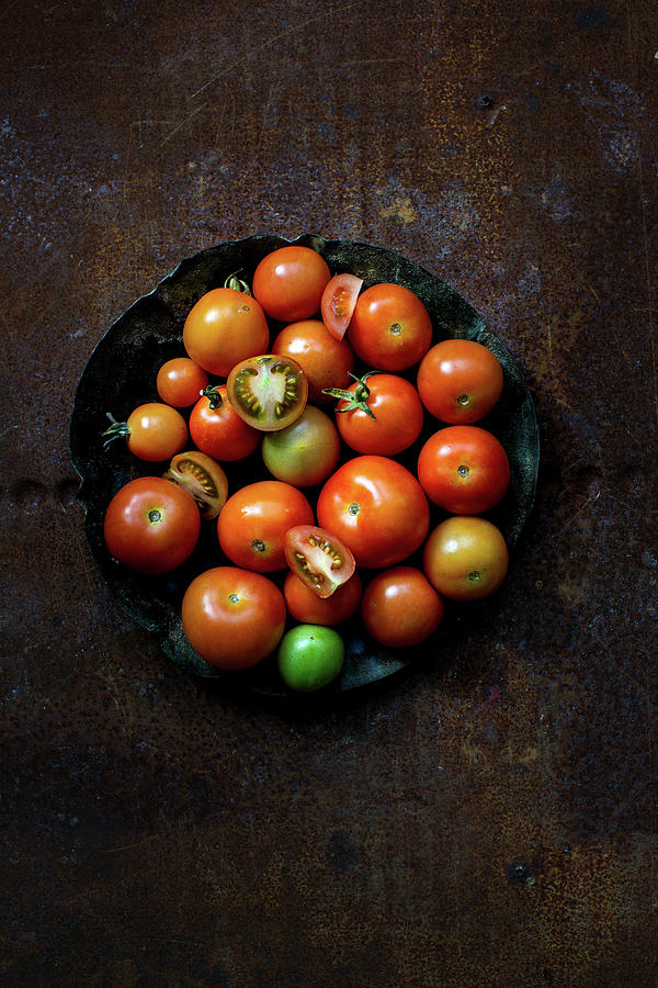 Various Garden Tomatoes On A Plate Photograph by Lara Jane Thorpe