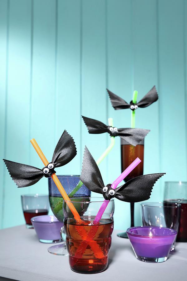 Various Glasses With Drinking Straws Decorated For Halloween Party Photograph by Thordis Rggeberg