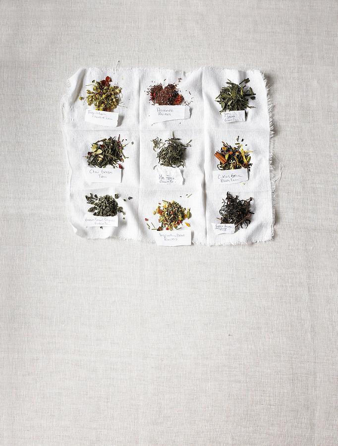 Various Labeled Teas On A White Cloth Photograph by Vincent Noguchi Photography