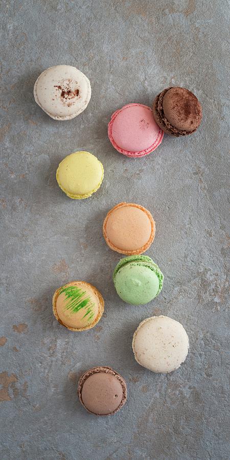Various Macaroons On A Stone Surface Photograph by Sonia Chatelain