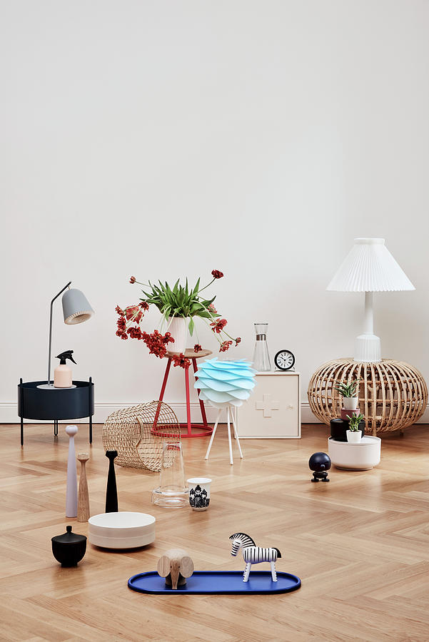 Various Ornaments On Side Table And On Pale Parquet Flooring Photograph by 79berlin