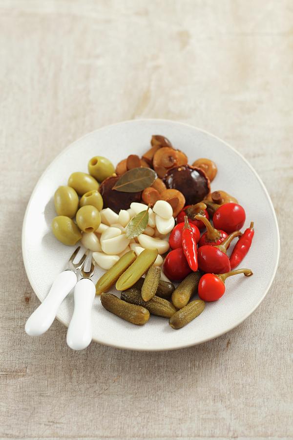 Various Pickles  Cucumbers, Mushrooms, Pepper, Garlic, Olives Photograph by Castilho, Rua