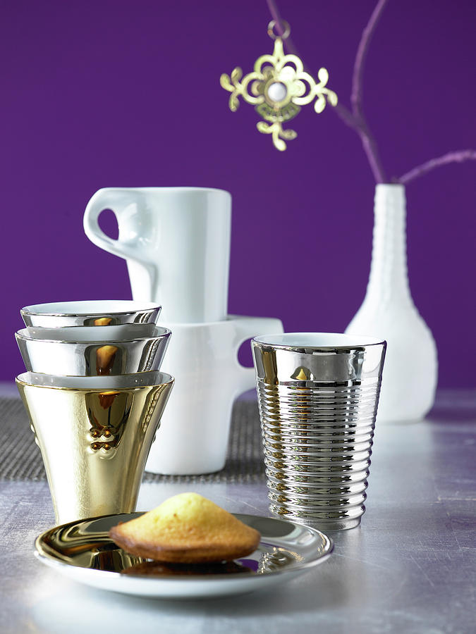 Still Life Photograph - Various Platinum, Ceramic And Gold Plated Cups by Jalag / Julia Hoersch