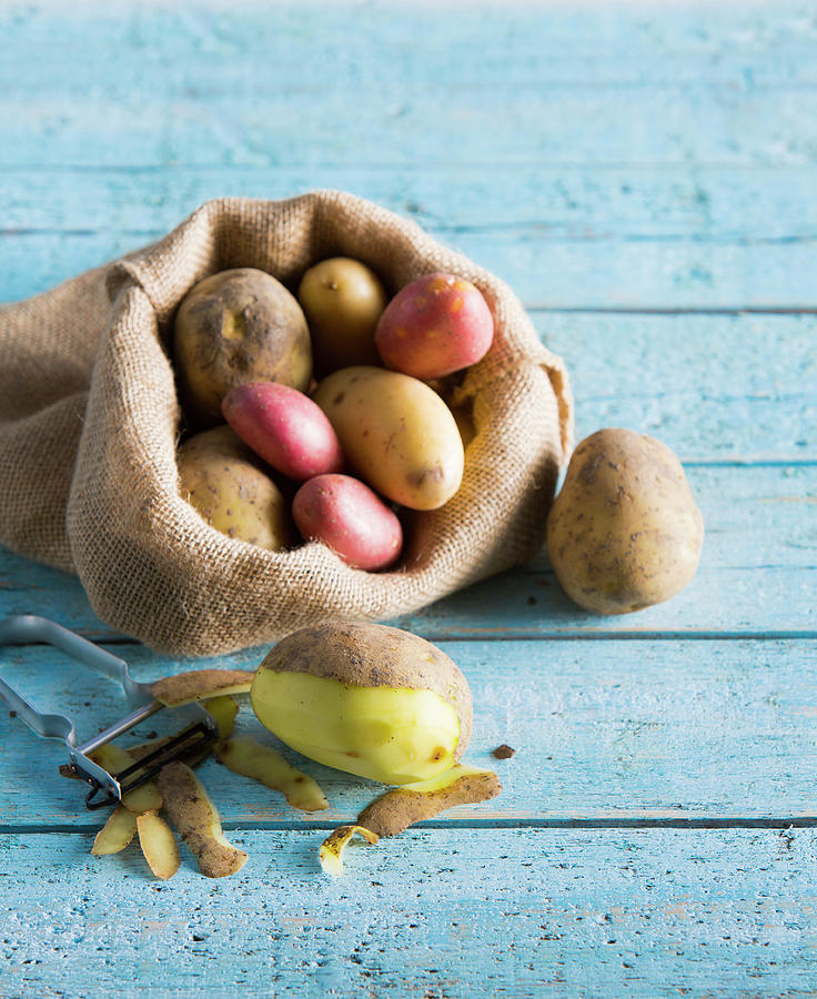 Various Potatoes In A Jute Sack Photograph by Peter Kooijman
