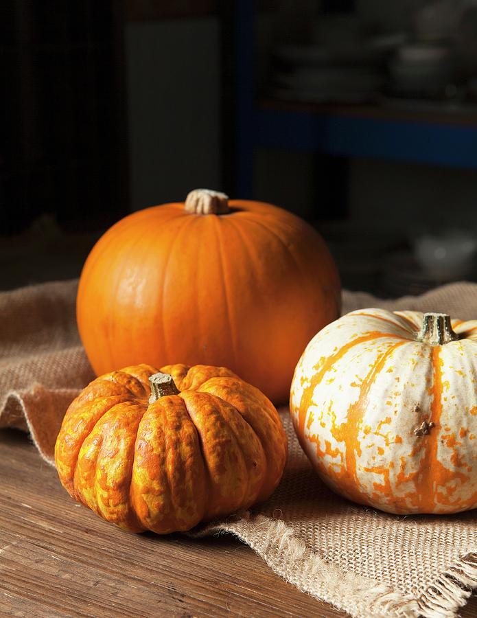 Various Pumpkins On A Jute Cloth Photograph by Stacy Grant