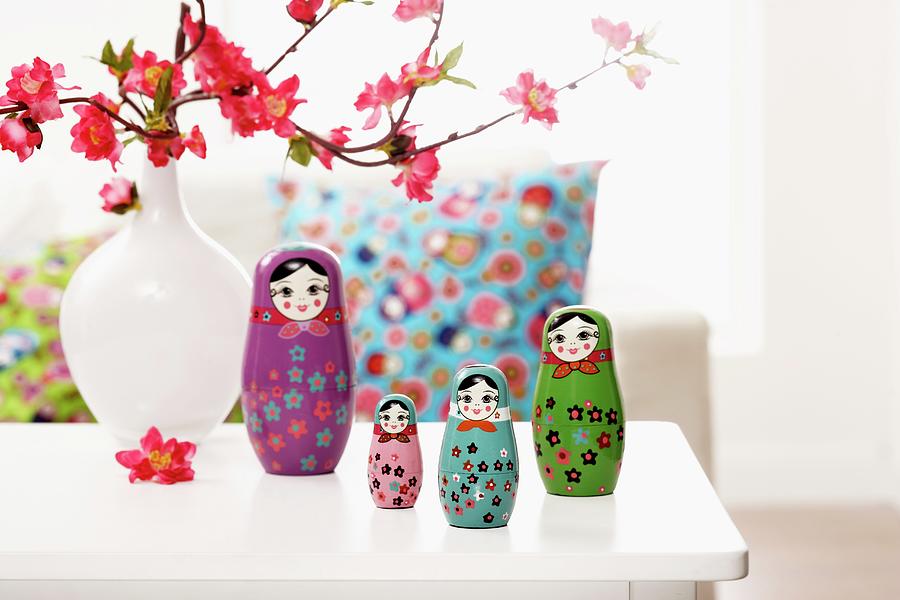 Various Russian Dolls And Vase As Table Arrangement Photograph by Heidi Frhlich