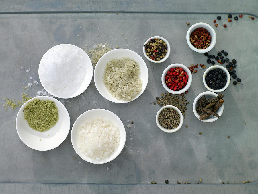 Various Salt And Pepper In Small Bowls Photograph by Jalag / Michael Holz