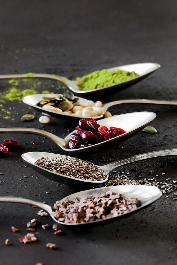 Various Superfoods On Tablespoons Photograph by Birgit Twellmann