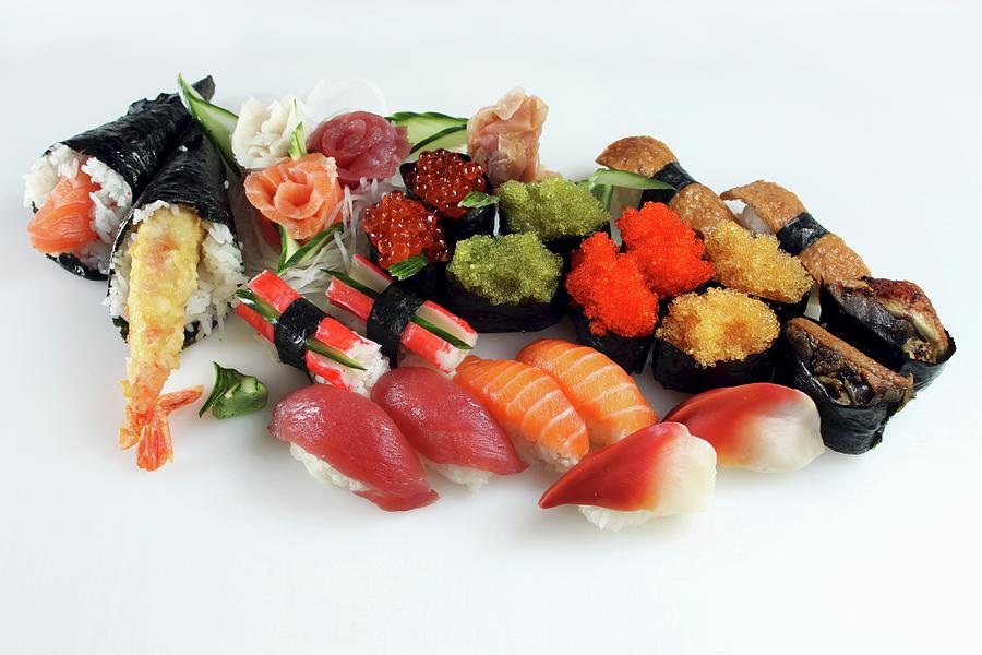 Various Sushi On A White Surface Photograph by Jan Prerovsky